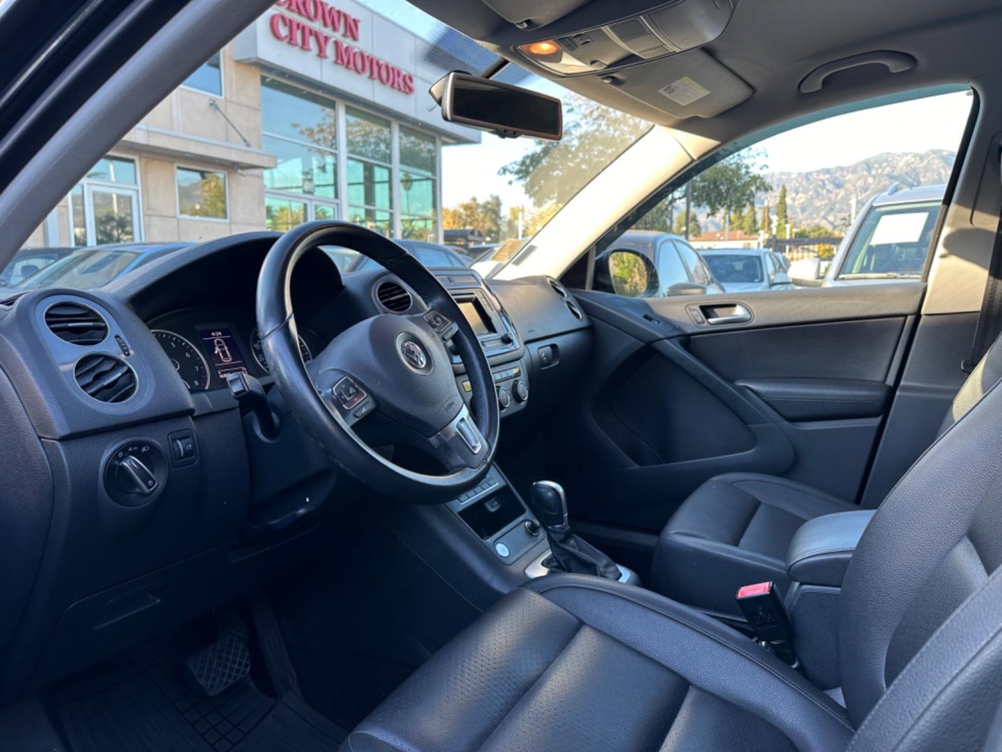 2016 Black /Black Volkswagen Tiguan (WVGAV7AX5GW) , AUTOMATIC transmission, located at 30 S. Berkeley Avenue, Pasadena, CA, 91107, (626) 248-7567, 34.145447, -118.109398 - Crown City Motors is a used “Buy Here Pay Here” car dealer in Pasadena CA. “Buy Here Pay Here” financing, means that when you purchase your vehicle from our dealership, that you make the payments to the dealership as well. We do not need the banks approval to get you approved for a used auto - Photo#9